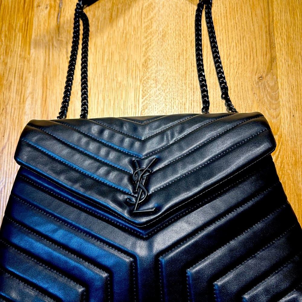 Luxury Designer Hand bag. Black new. 13 x 10